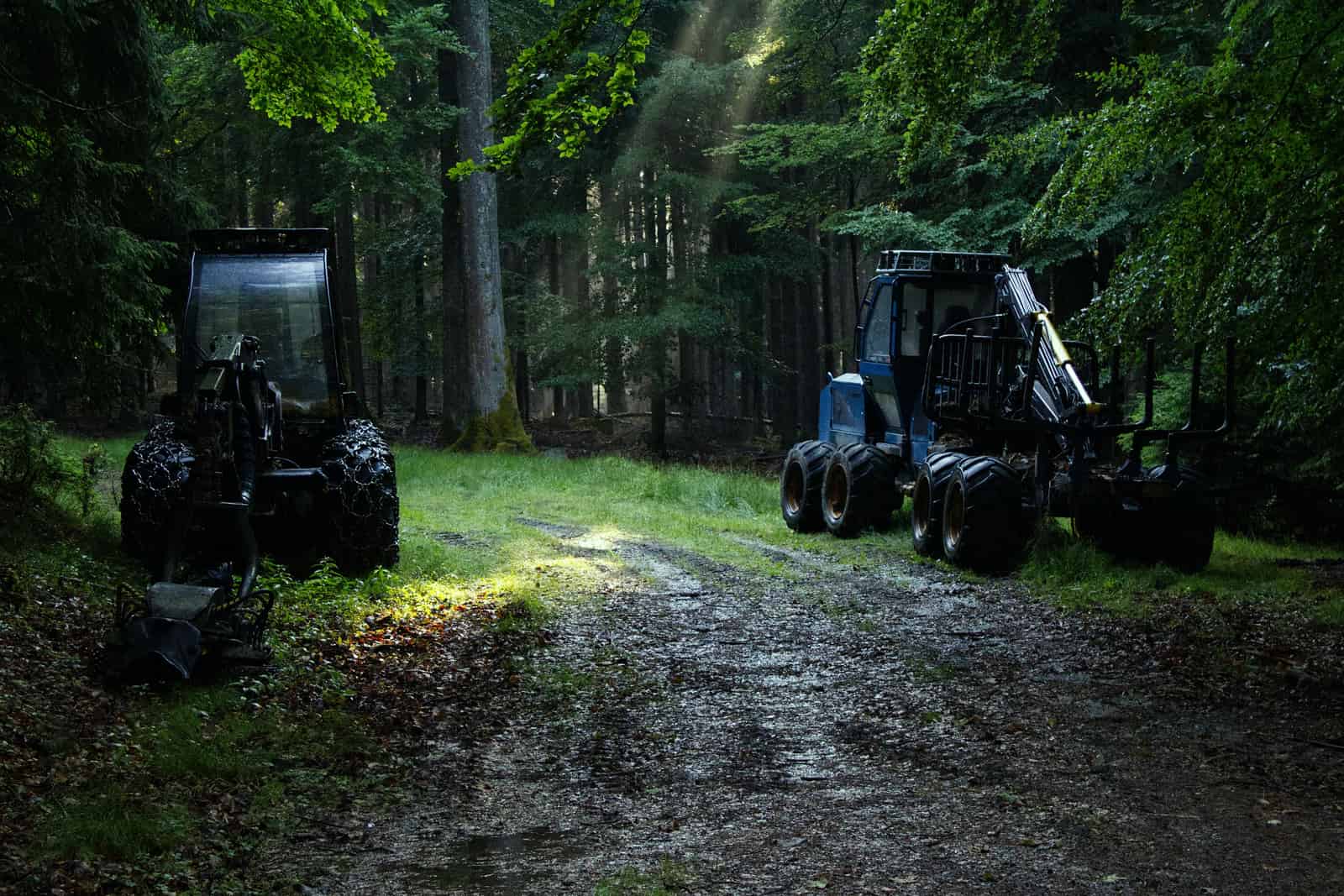 Two large machines standing side by side outdoors.